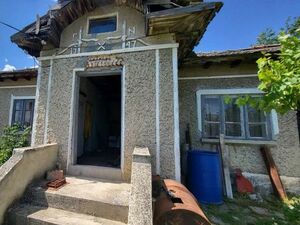 Solid brick house with its own yard in the village of Kapino